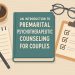 Premarital counseling session materials, therapy notes, and wedding rings on a table